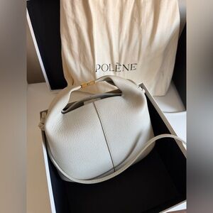 Polène handbag calf leather
100% cotton twill lining.